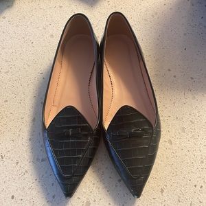 Two-tone pointed toe loafers in croc-embossed leather.